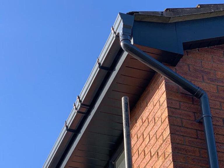 Black uPVC fascia, soffit and guttering installation
