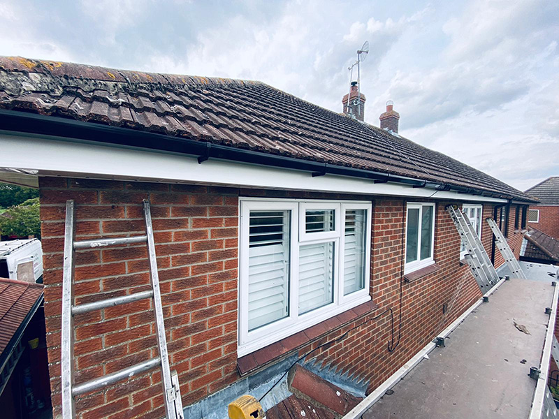 Our team installing fascia, soffit and guttering in Norwich